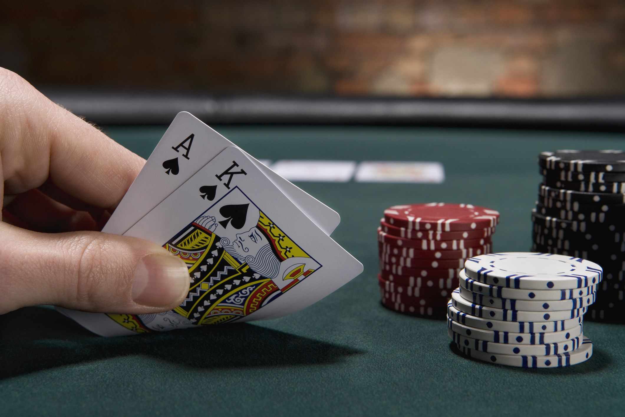Closeup of a winning blackjack hand and piles of chips