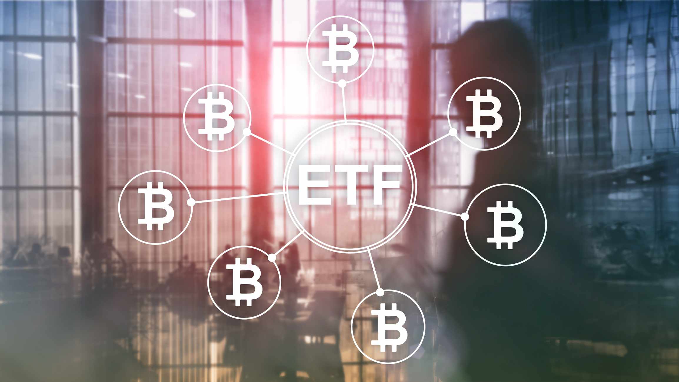 An office overlayed with ETF connected to bitcoin symbols