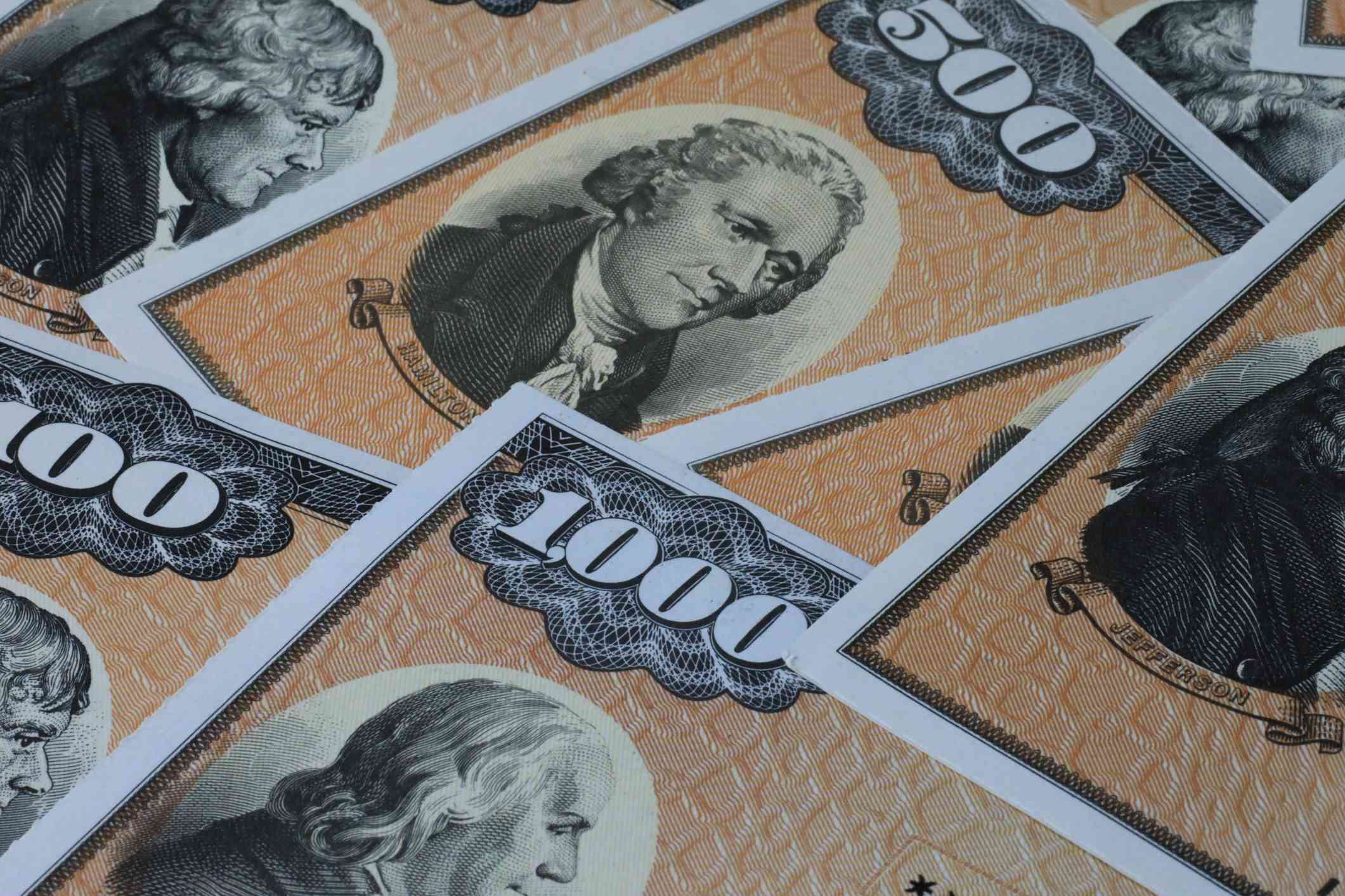 Close up of U.S. bonds in $500 and $1000 denominations